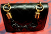 BLACK QUILTED PATENT LEATHER CLUTCH WITH GOLD BUCKLE